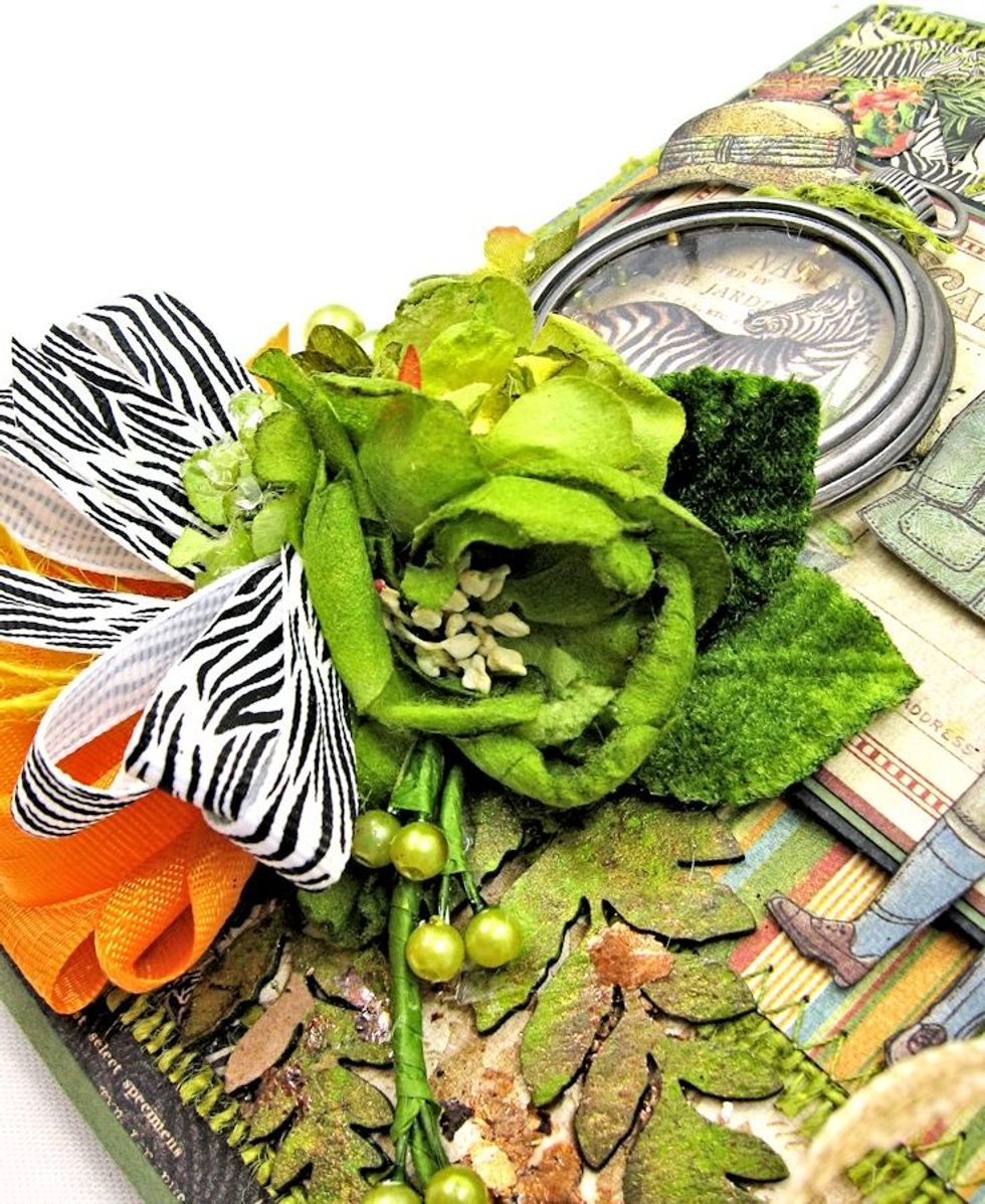 Tie bows with Tangerine Delicate Stitched Satin and Zebra Print grosgrain ribbon. Add a dot of hot glue beneath the flowers and push ribbons in place with points of scissors.