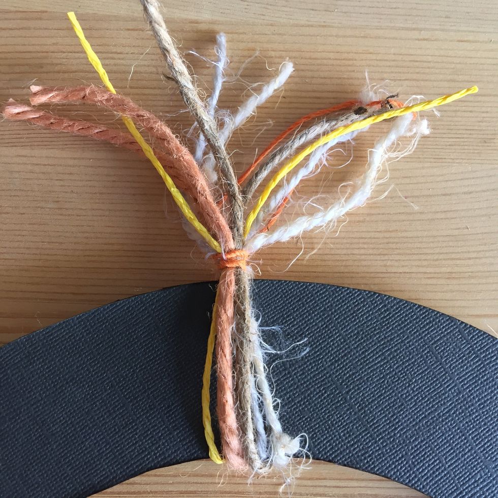 Tie cords as shown at 12, 3, 6 and 9.