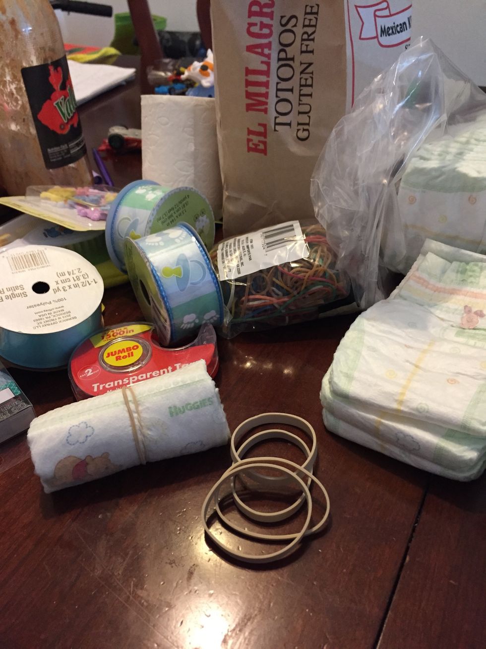 Tie each diaper roller with band