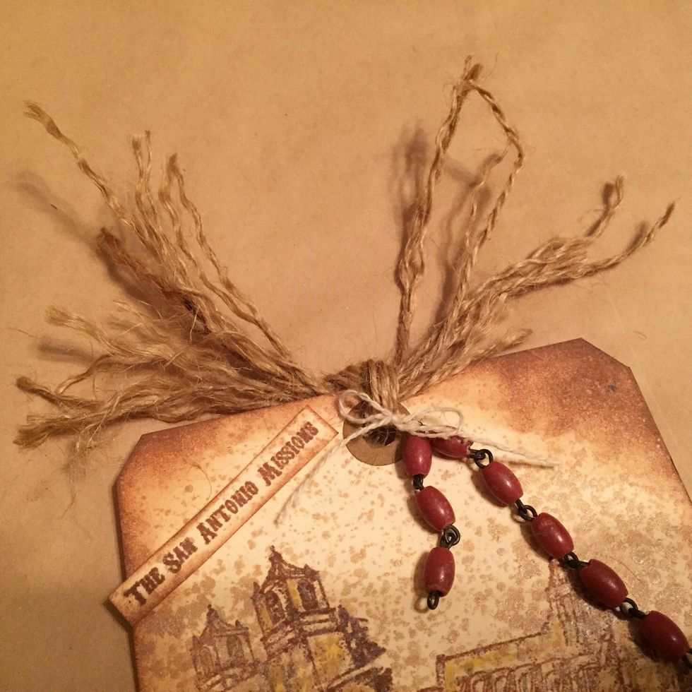 tie jute, then tie string in a bow, fraying and trimming both as needed