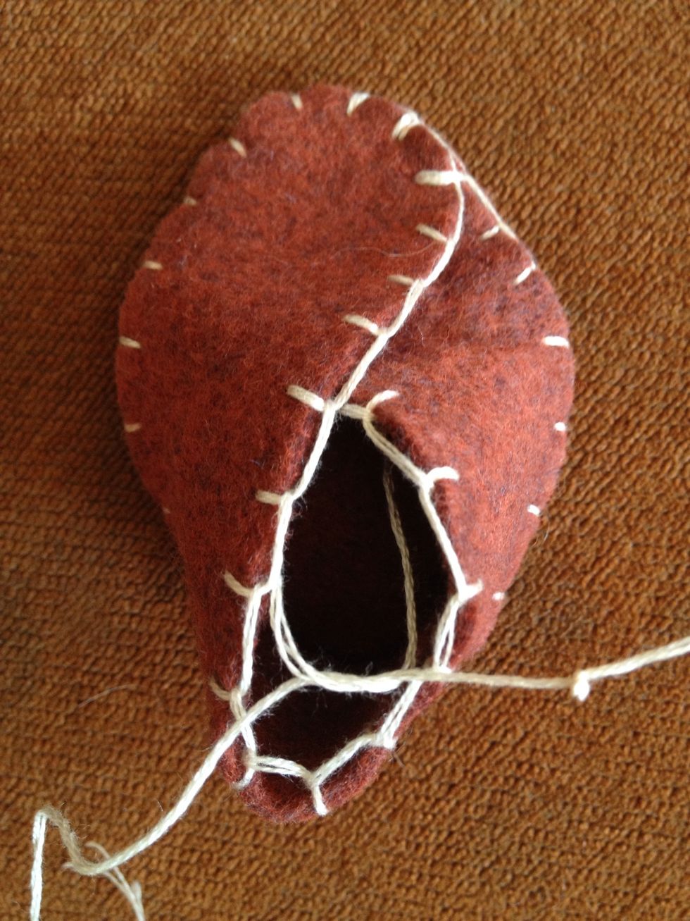 Tie off the two tails so the knot is hidden.