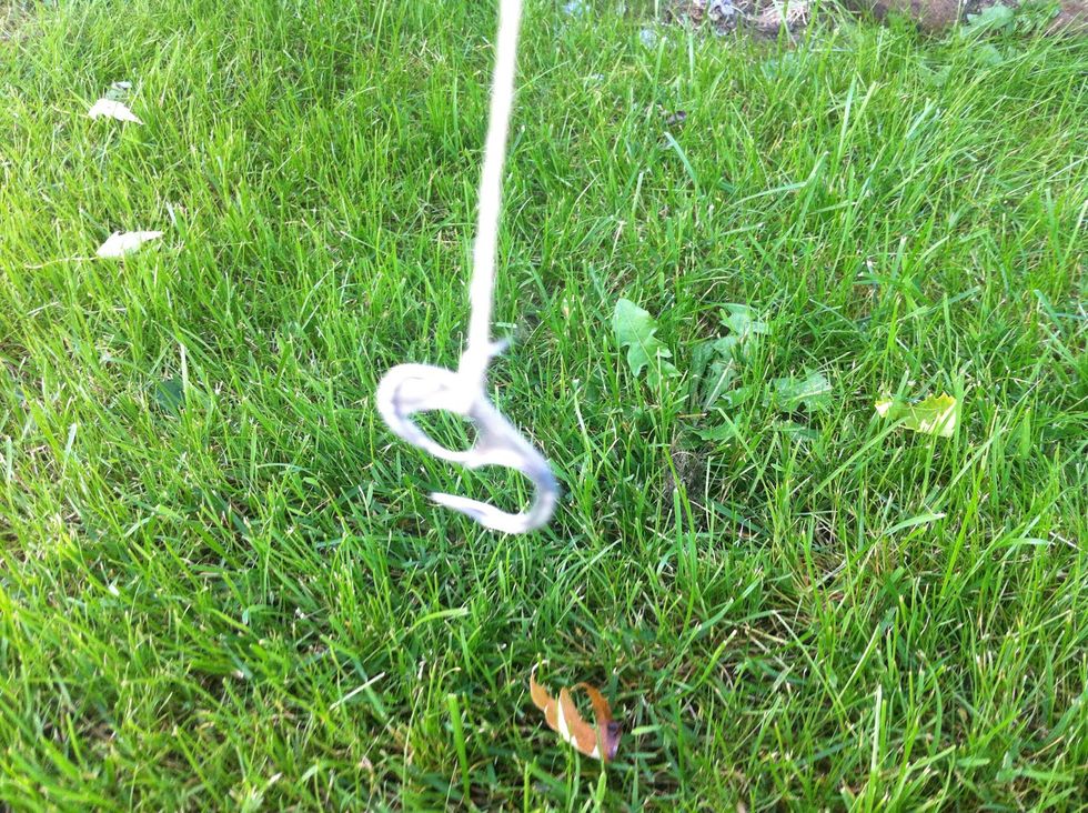 Tie on what ever string you can find or make. Even strips from a shirt or make twine out of the bark of sticks. Get some bait or tie fibers on to make a sort of fly lure. And hope the fish are biting.