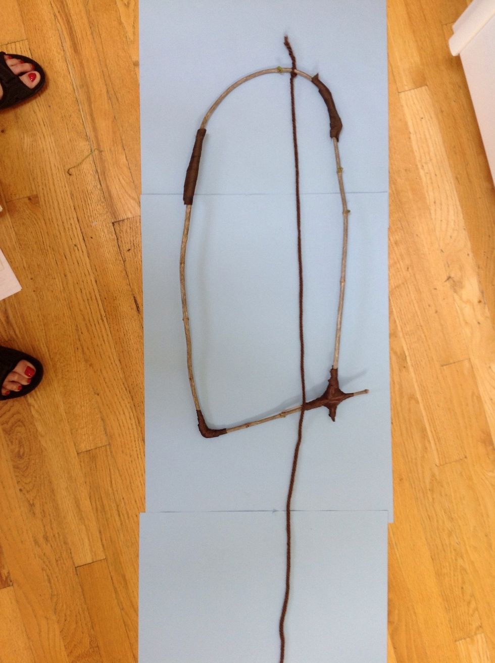 Tie one end of one piece of yarn to the top of your loom. Leave a 3 inch tail because you will need this short end to be this long because you will need to make a double  knot.