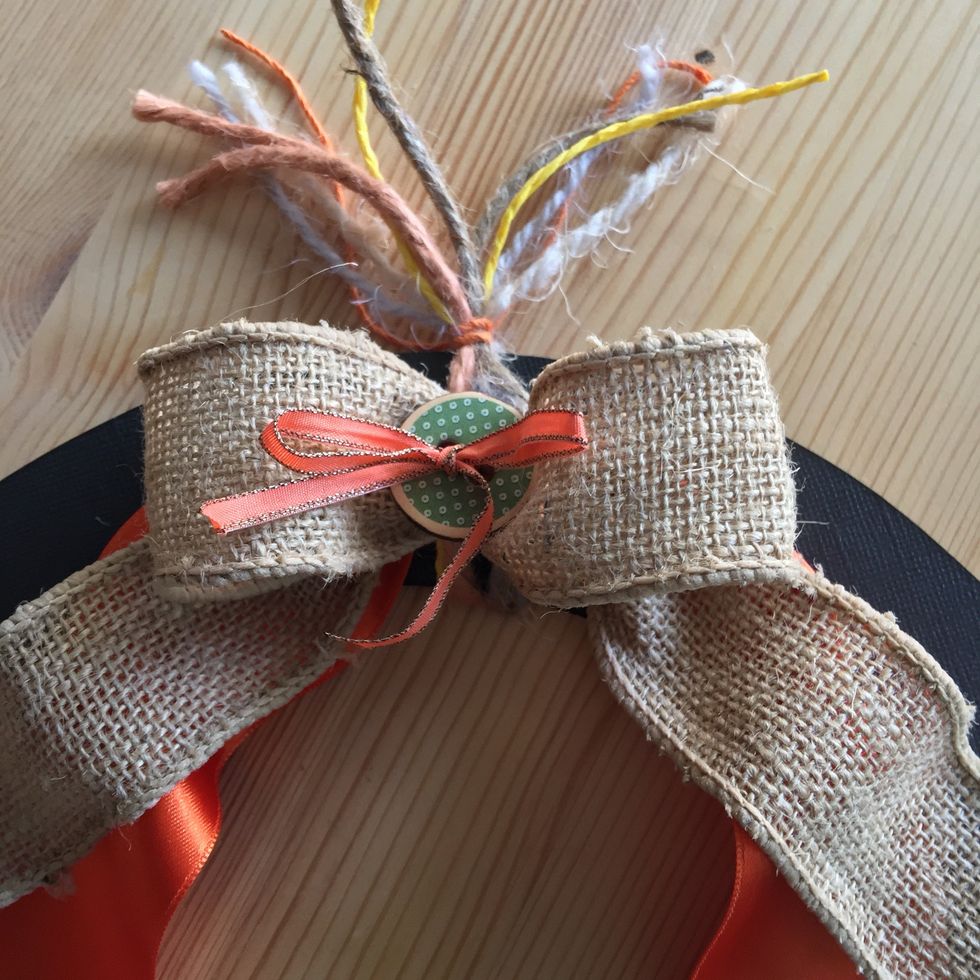 Tie the bow and add a chipboard button.