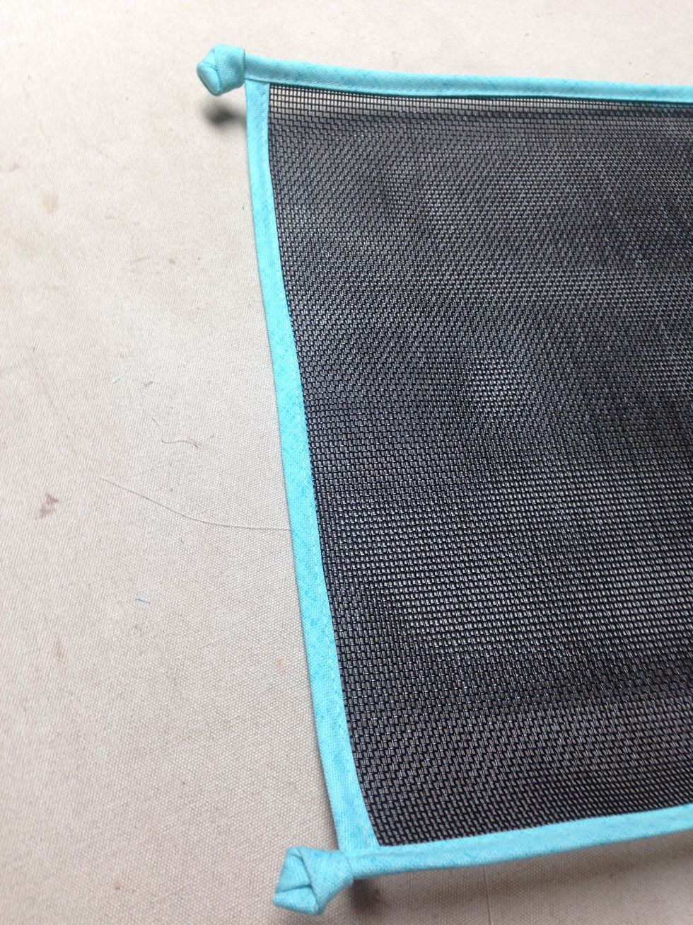 Tie the knots at the corners