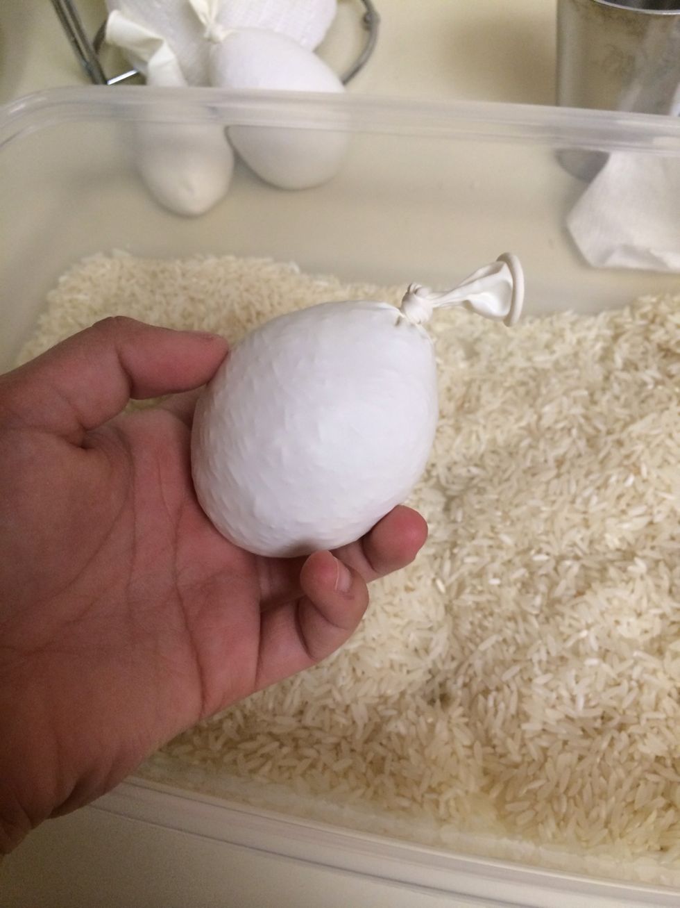 Tie the neck of the balloon. Make sure no air gets into the neck while you're tying.