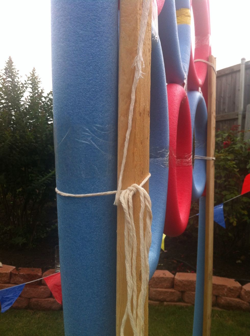 Tie the noodles to the wood....