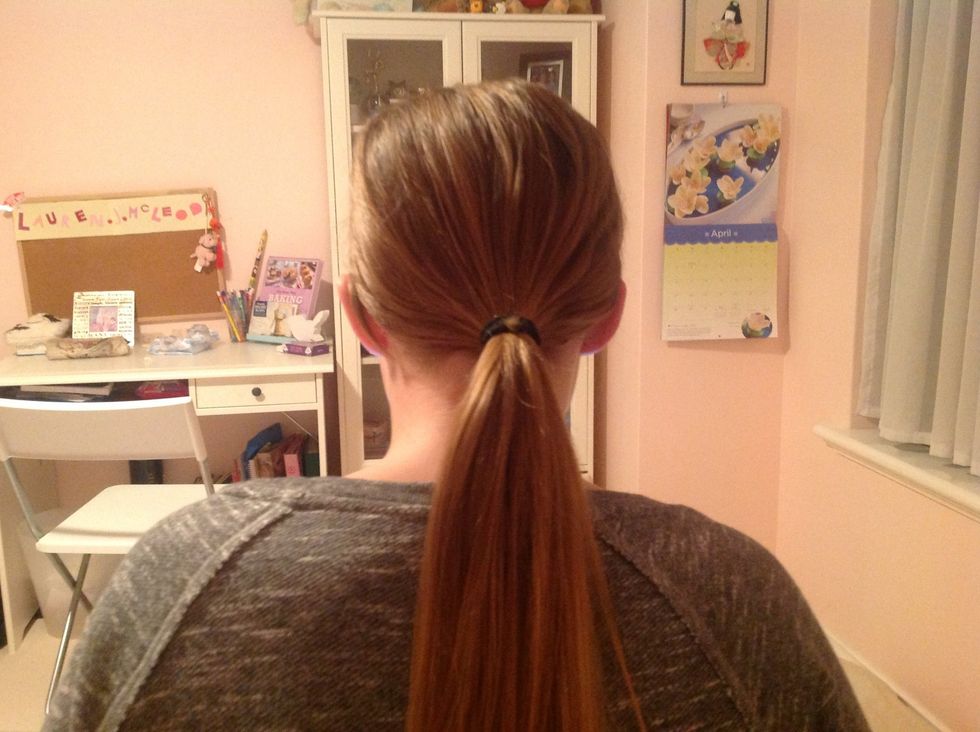 tie your hair into a low pony tail!
