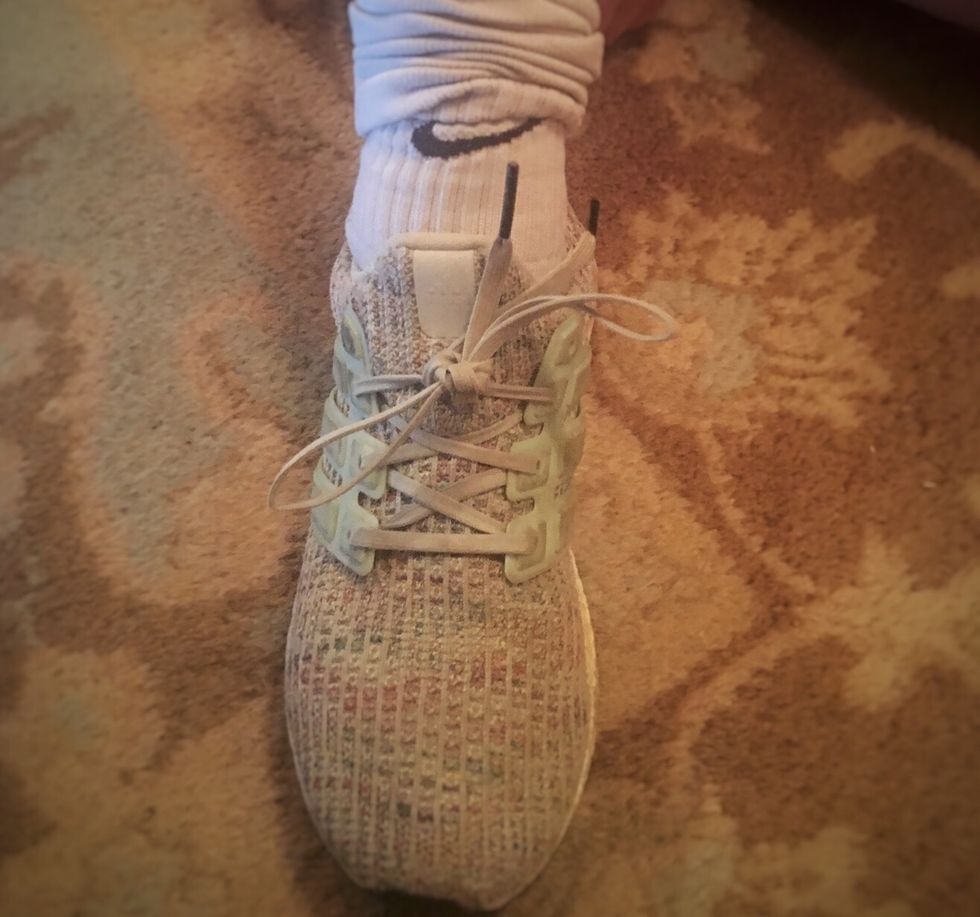 Tie your laces together to make a double knot.