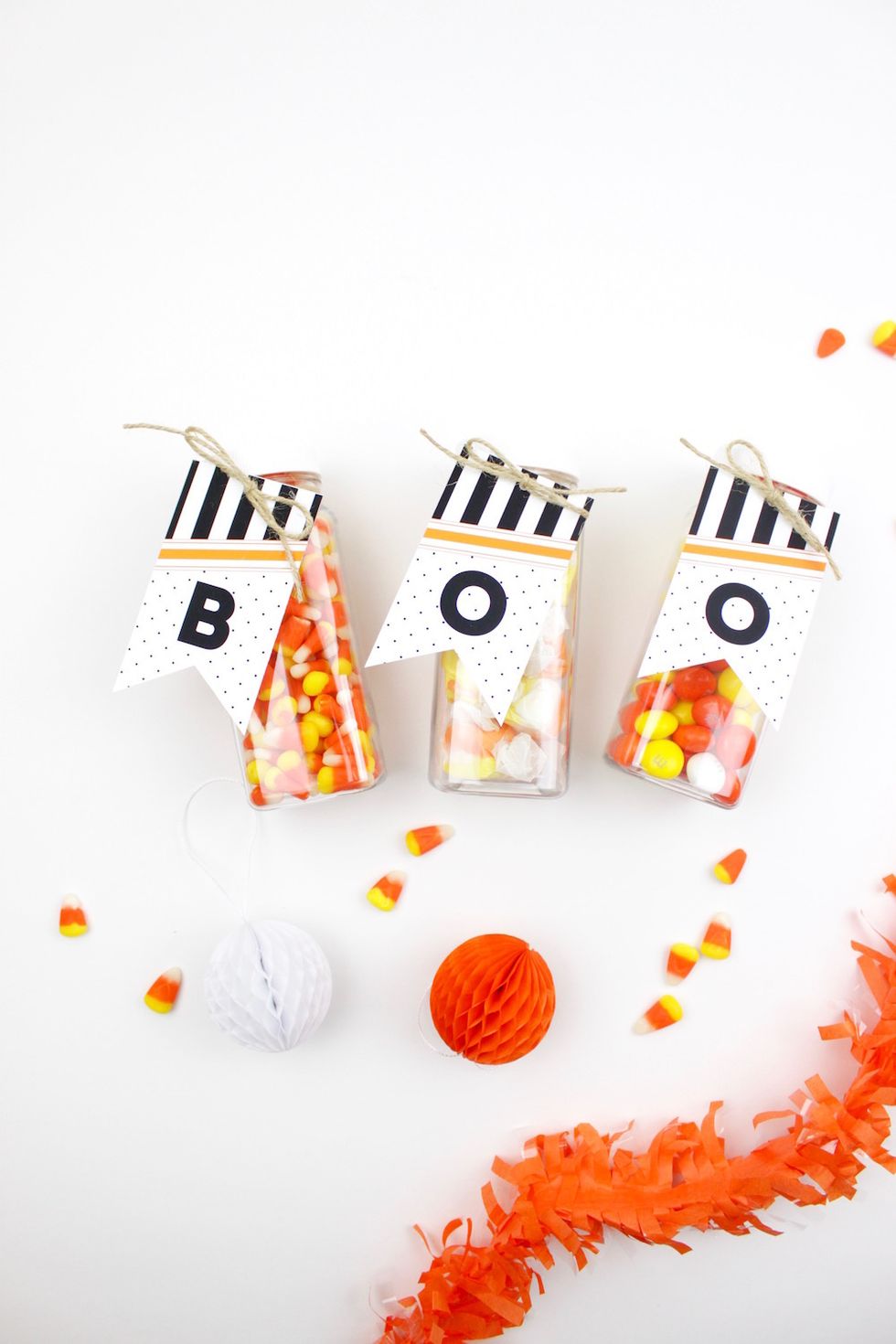 Tie your tags onto the candy bottles with natural or colored twine