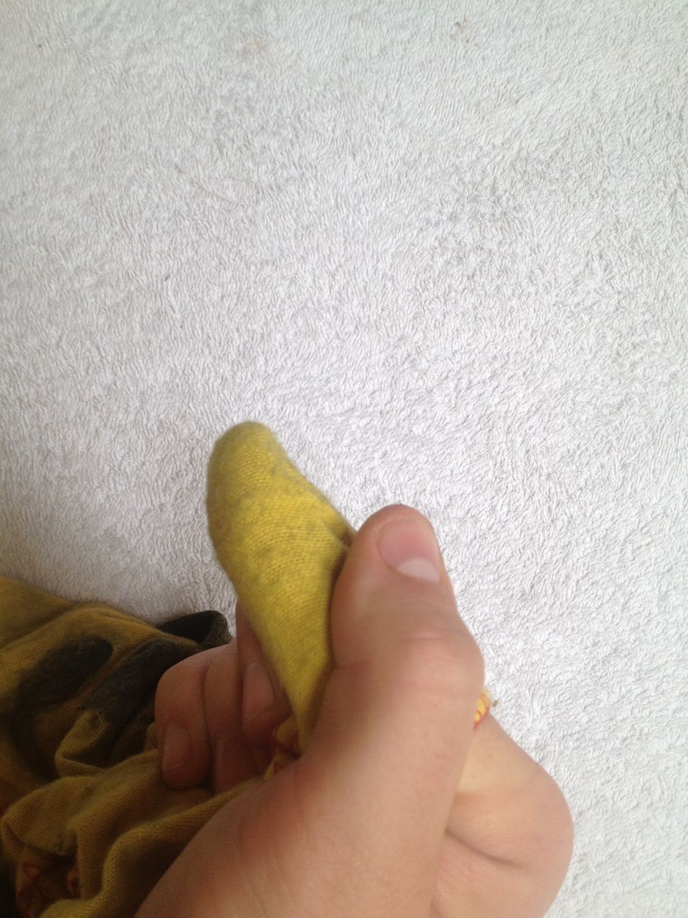 Tight around the finger with no creases.
