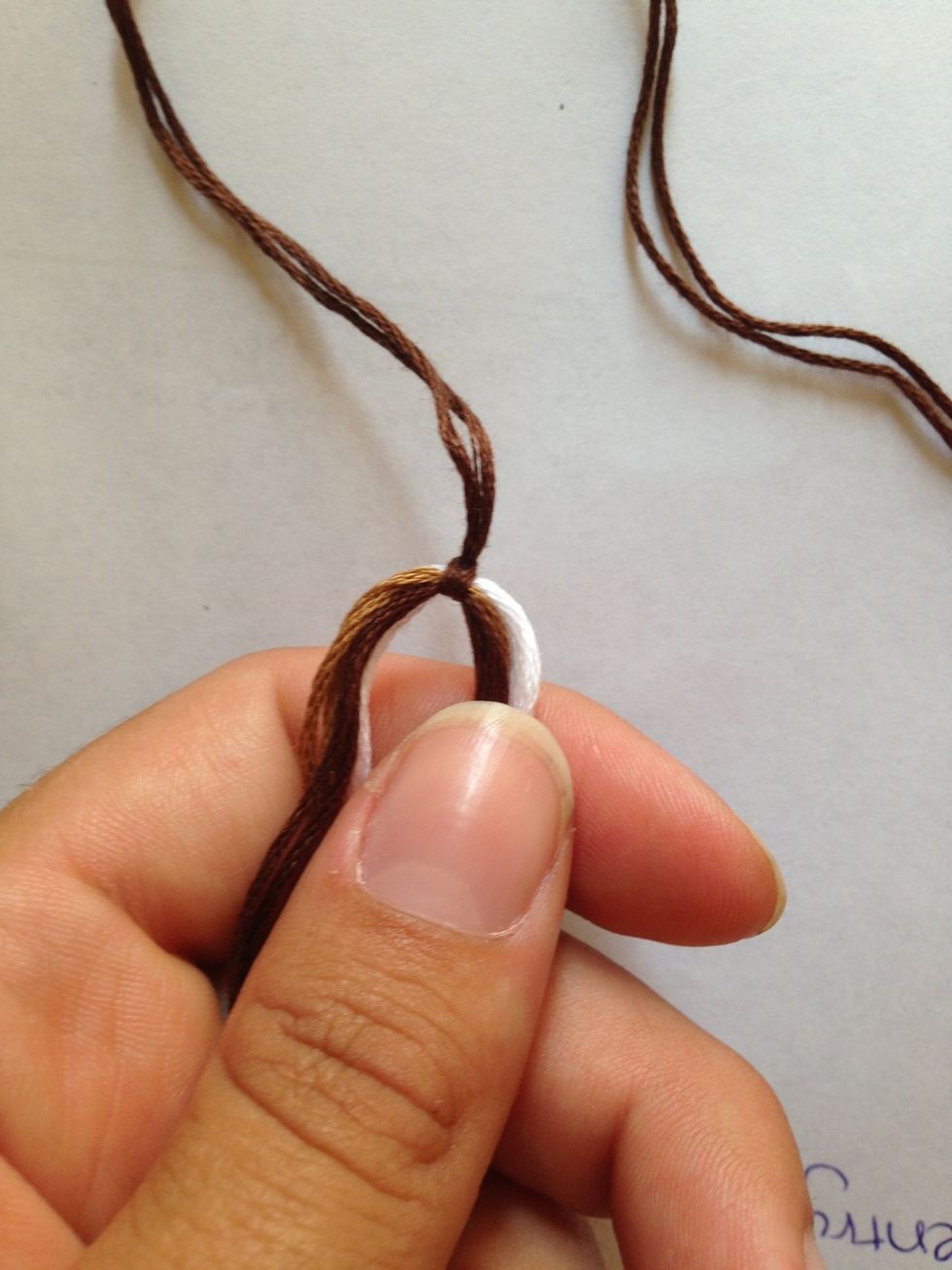 Tighten! Pick a side to start tying with. This is going to be good practice to get out basic knots down, for those of you who are beginners!