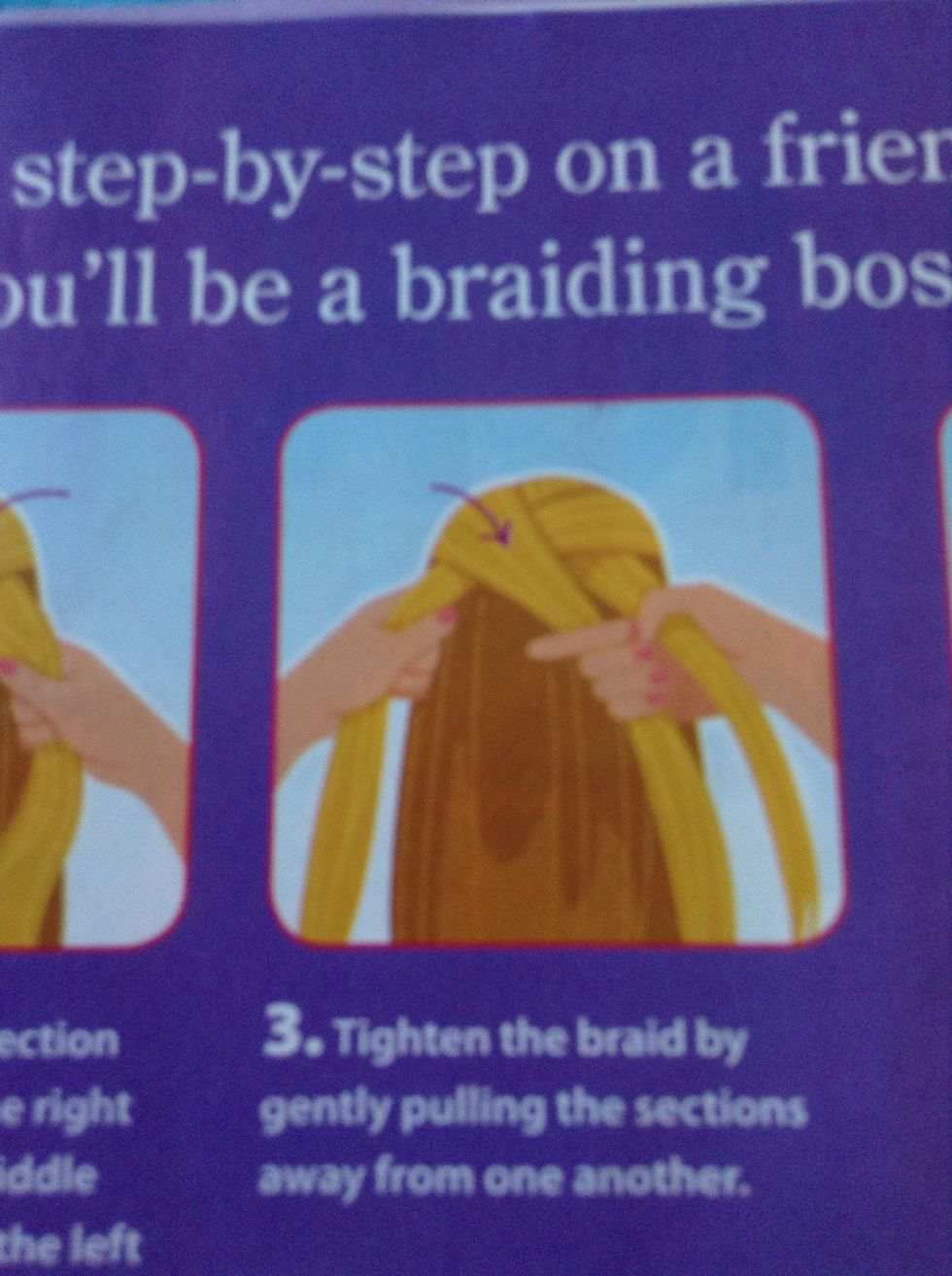Tighten the braid by gently pulling the sections away from one another.