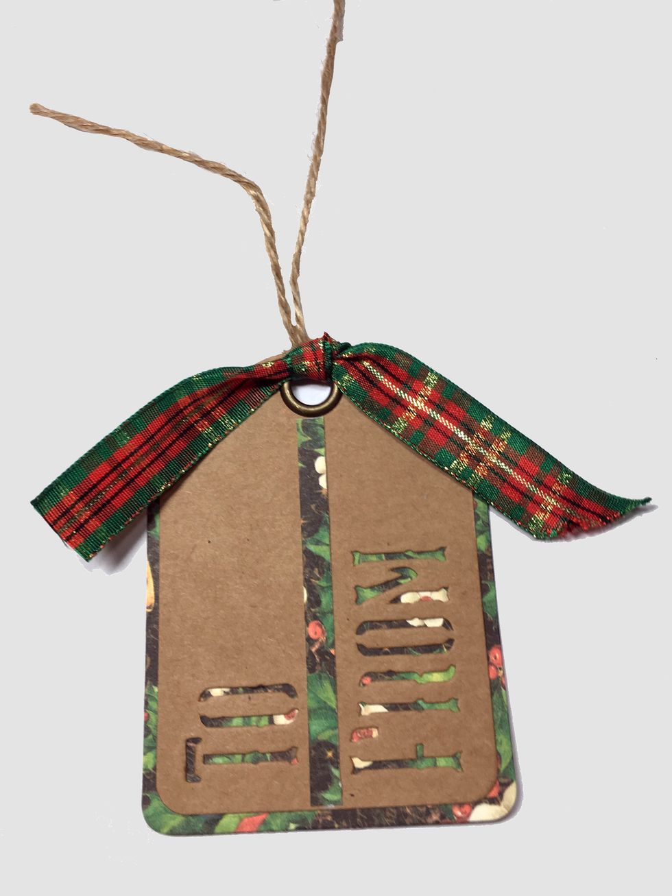 Tighten the knot and it should look something like this. Don't fret over this too much. We're going to put a flower over it so the knot won't show. Trim the tails of the ribbon.