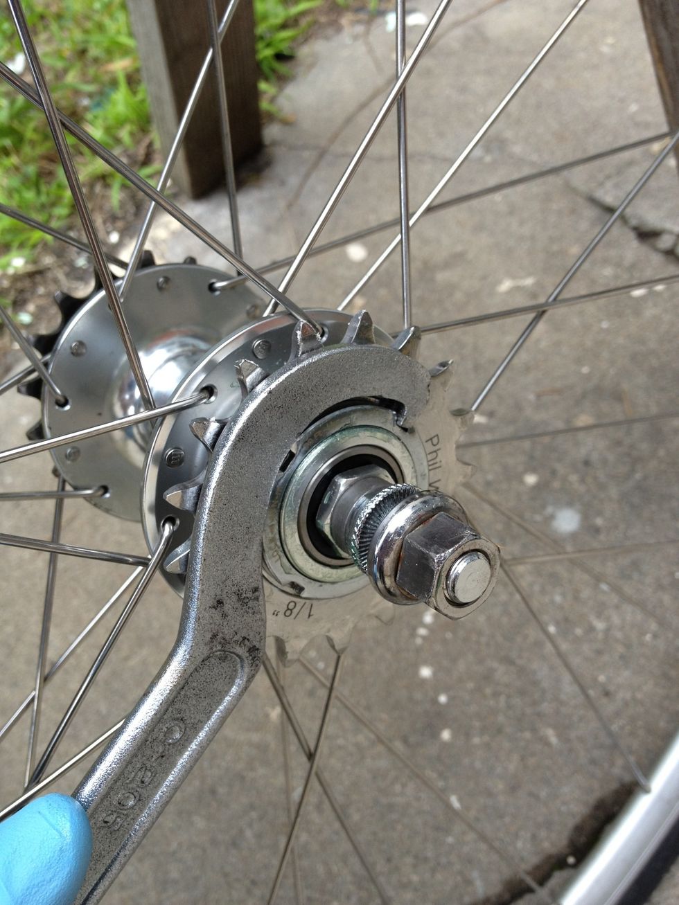 Tighten the lockring with a matching tool. Most look like this and work with a variety of notch patterns. Check with your local bike shop if you're not sure which tool works with your ring.