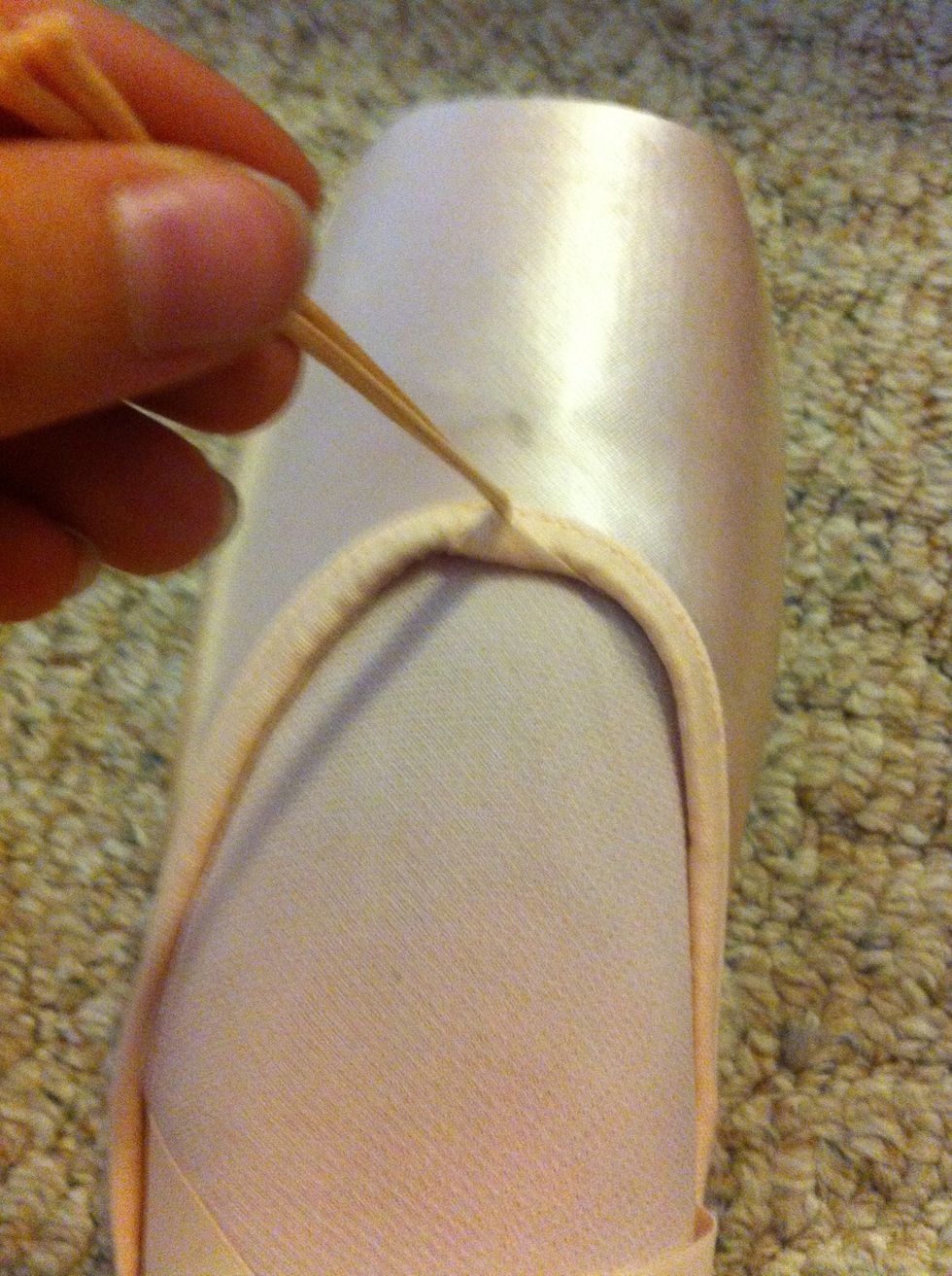 Tighten your drawstring, if you have one, to your liking. I don't use mine much. Some brands like Russian Pointe don't make their shoes with drawstrings, however, some models do.