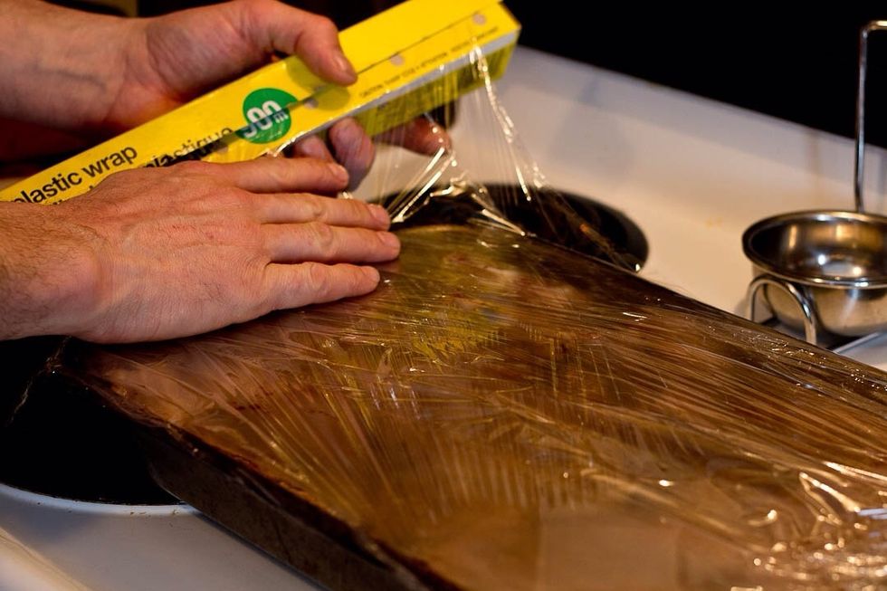Tightly seal the pan with plastic wrap and then tin foil.