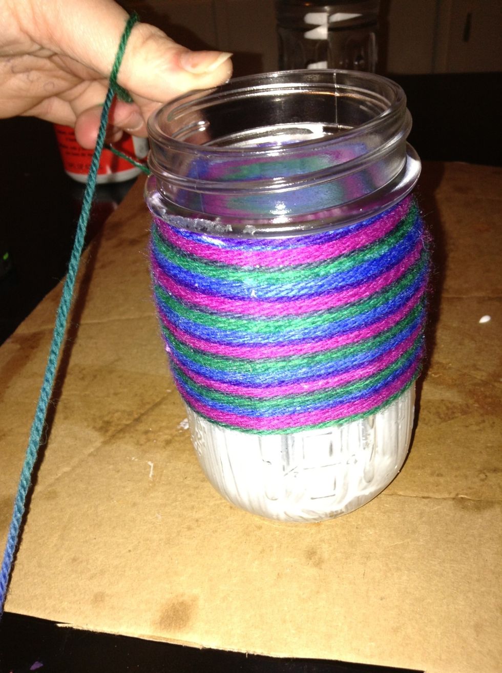 Tightly Wrap string around the jar.