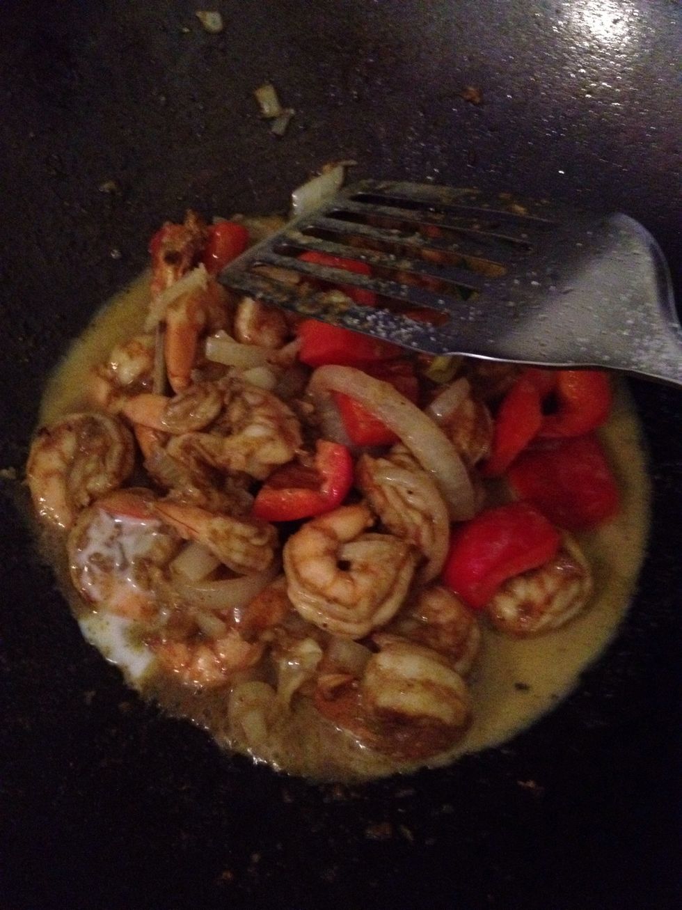 Till the paprika is ready,put the coconut cream,add sugar(sugar and coconut cream always make curry tasty),then turn it to high heat,till the coconut cream start to spoil