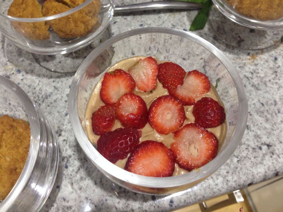 Till you think you have added enough chocolate in your cream, place in dish and then add some cut strawberries on top. (If you can't taste the toblerone enough, melt some more and add).