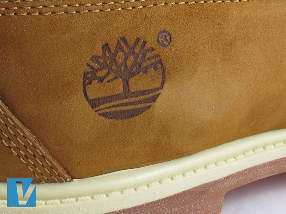 Timberland boots feature the Timberland tree logo on the outside of the boot, usually on the heel. Check the logo for any errors in design and spacing. Note the registered trademark circled R.