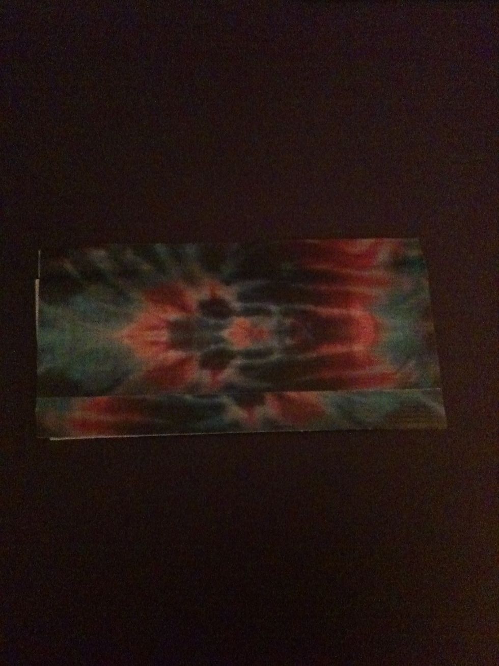 Time for credit card holders. Make a sheet of duct tape (like you did in the beginning) that is slightly taller and longer than your credit card/gift card.