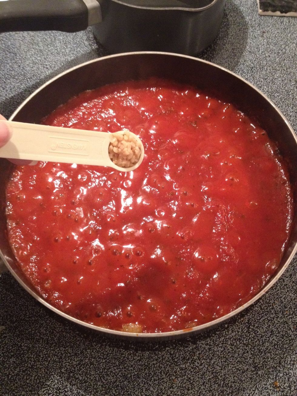 Time for extras! Add garlic.