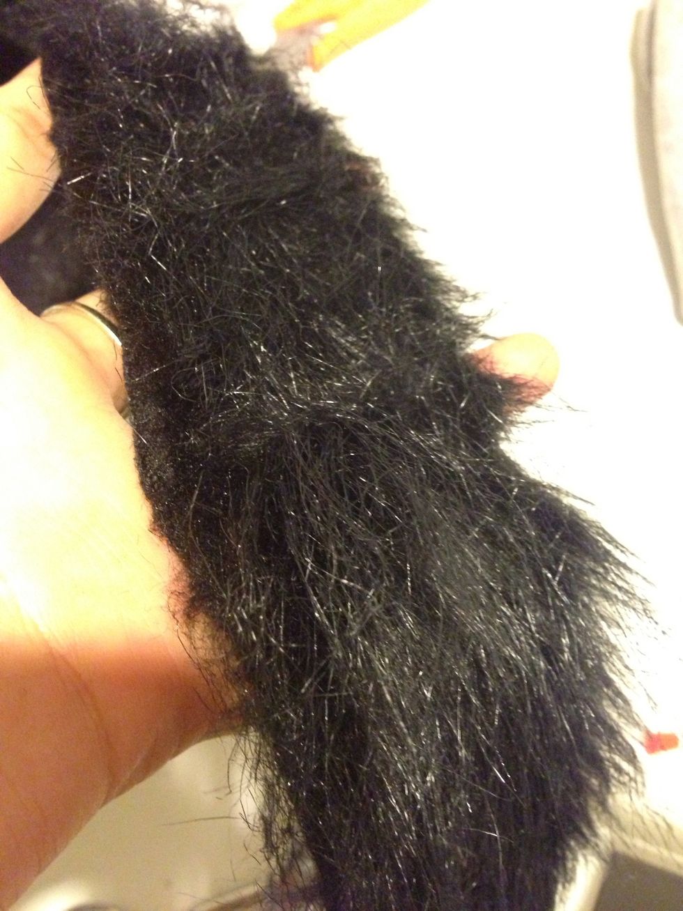 Time for hair on the donkey :) cut a piece out - note this fabric is like a dog shedding be ready to lightly pull any loose hair off after u cut