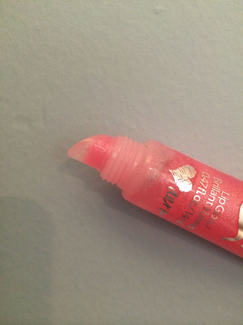 Time for the shine! This is just a cheap, thick gloss I picked up from Aeropostale. Vaseline and a Q-Tip also works. Apply an even coat on your lips.