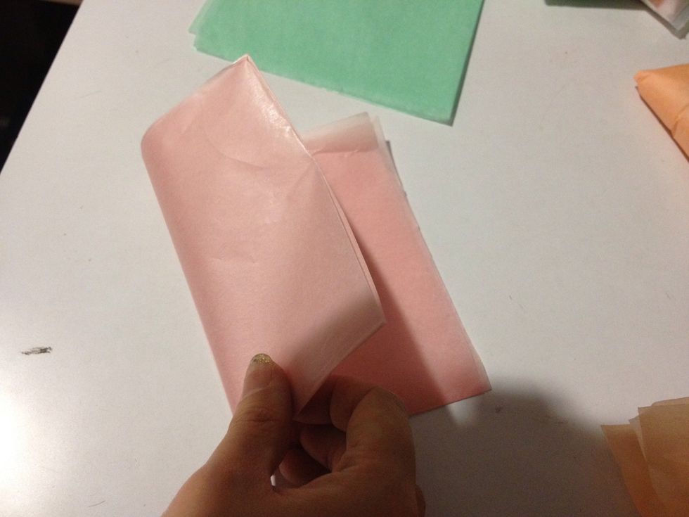 Time to accessorize it! This is the fun part, fold the paper to a desire size