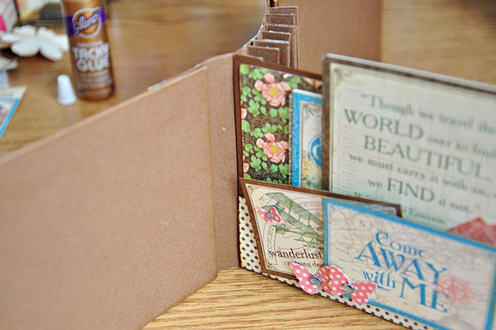 Time to assemble the pages. My preference is to design the pockets first  before adhering to the binding. Just make sure to strategically place the bulky embellishments in each page.