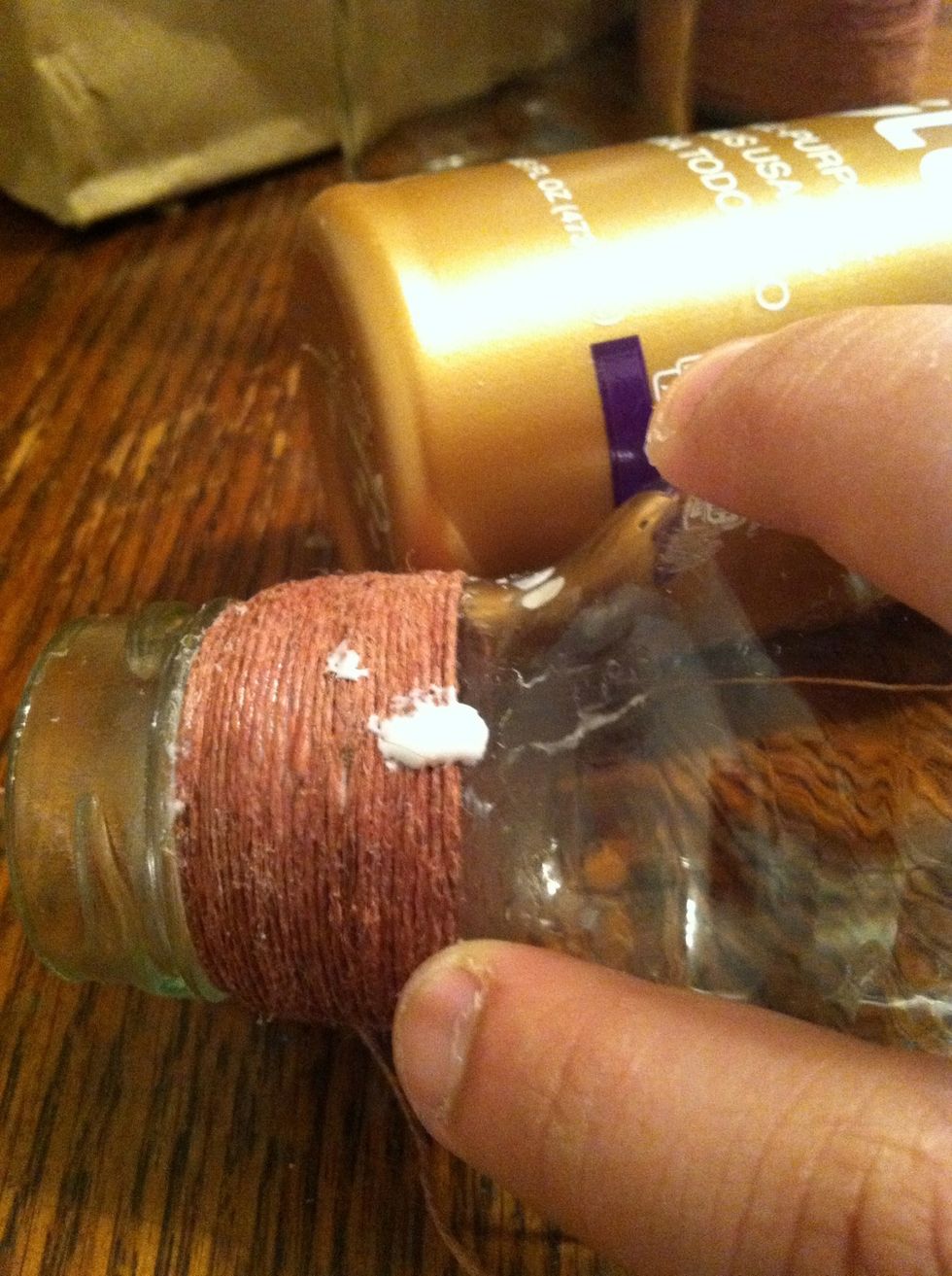 Time to change or add a color. Add a dot of glue. Not too much or it may dry. Do not cut the first (soc). Hold it off to the side (same direction you've been wrapping.)