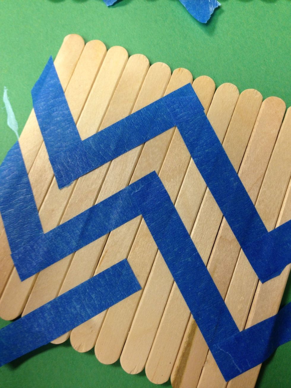 Time to decorate! Flip the coaster over and get ready to paint! You can use tape to map out a design or freehand it!