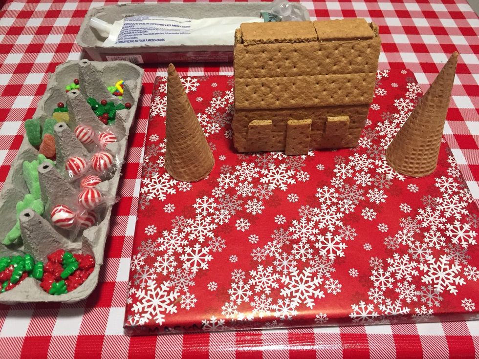 Time to decorate using icing and a variety of candy.