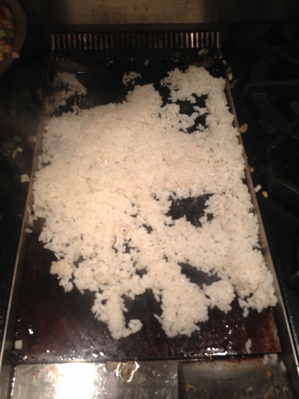 Time to fry rice! Add a little oil of course
