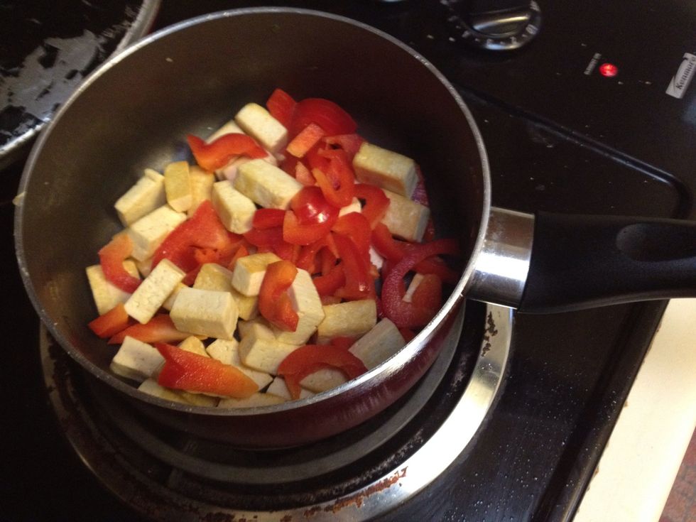 Time to grill tofu and red peppers! Cook the tofu alone first for a few minutes to firm it up so you don't over cook the peppers.