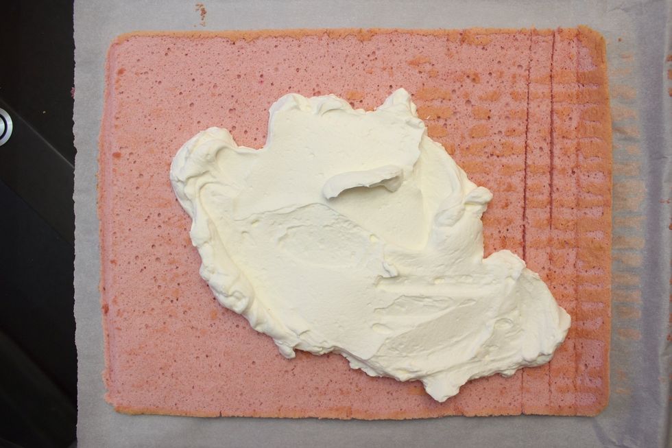 Time to lather on some of your frosting. You can fill it with chantilly creme (vanilla whipped cream), buttercream, jam, sprinkle on some chopped fruits.....etc.