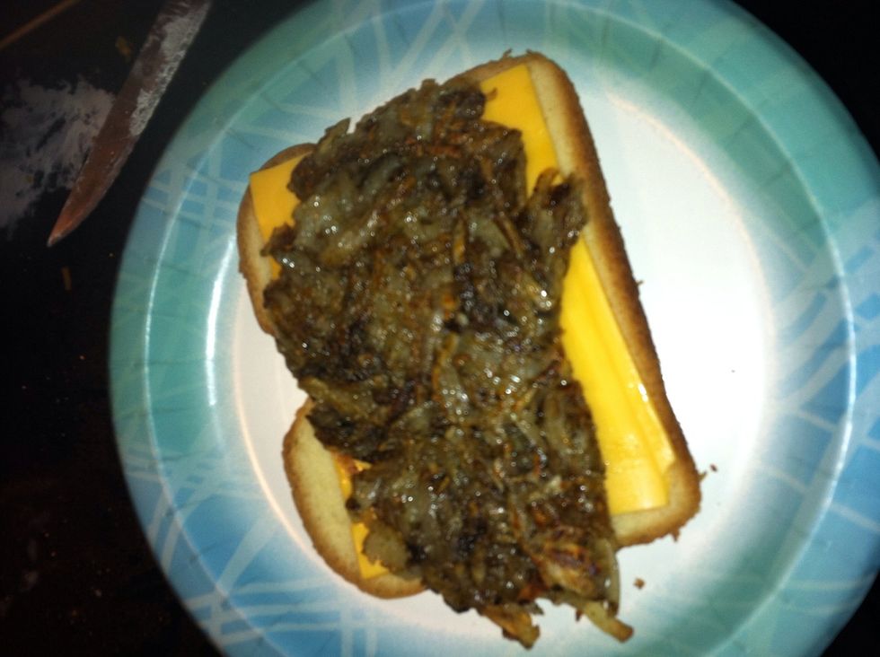 Time to layer. I put hash browns first. (They're funny looking because of the bacon grease. But mighty delicious.)