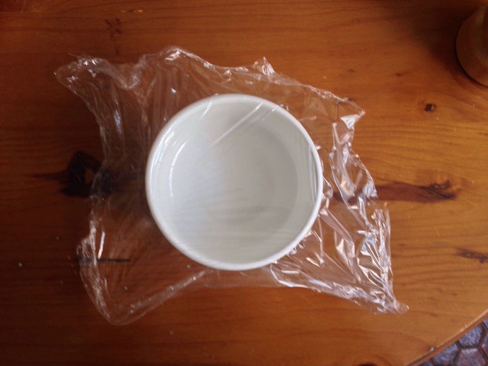 Time to make our egg! Over the ramekin put a piece of plastic wrap (you could use a mug or little bowl) make sure to push down a little bit the wrap inside the ramekin