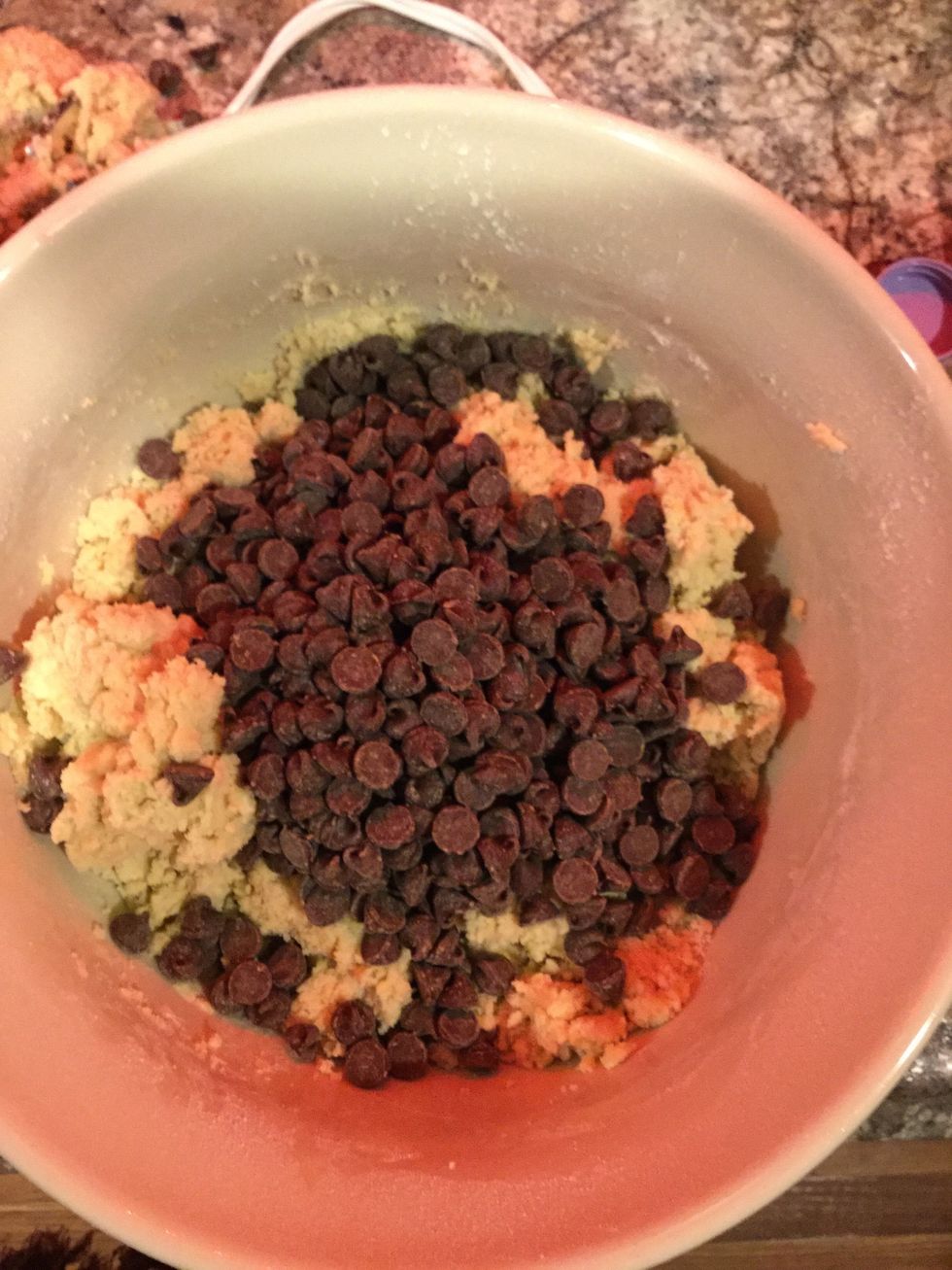 Time to open up your Nestle Toll House Semi-Sweet chocolate chips. Throw the chocolate chips in.