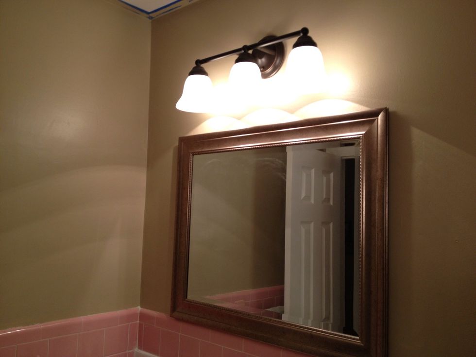 Time to paint.  Cover the corners of the ceiling, that are adjacent to the walls, with blue painters tape so that you won't get paint on your ceiling.