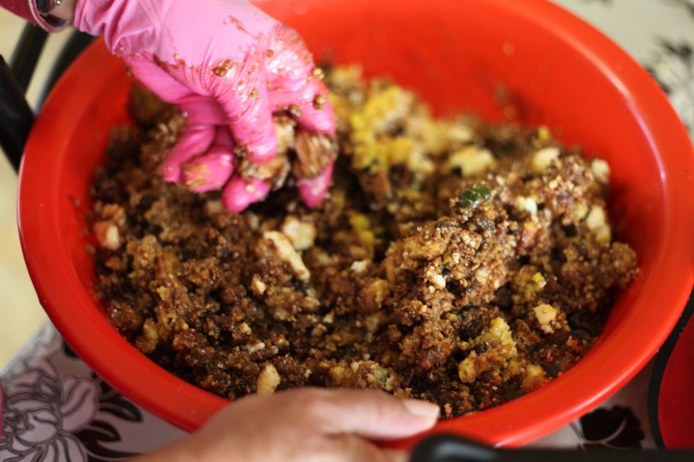 Time to play!!! Mix, crush, blend, turn, fold or flip. We've upgraded our gloves to industrial pink. Lol. Crush any large chunks of sponge. We want a fine crumble at this point.