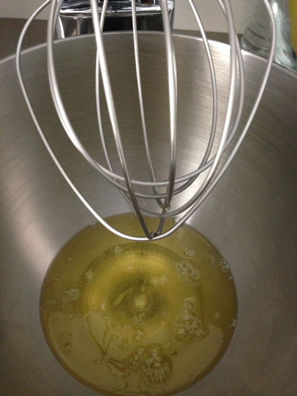 Time to start mixing your egg whites. Start low medium speed until frothy go on higher. Add vanilla sugar bit by bit. Stiff peaks