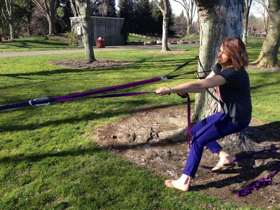 Time to tighten. Pull the webbing in the same direction of post 2. The slackline will tighten and lock off on its own due to the webbing friction. Make sure the webbing completely overlaps at C2!!!