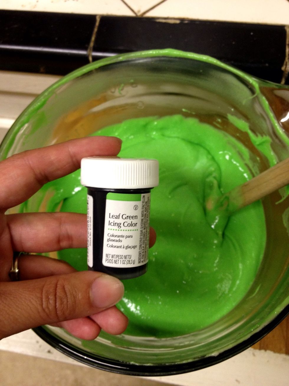 Tint your cake batter Frankenweenie green. I used Wilton's Leaf Green Icing Color. Add a little at a time until it is the color that you want.