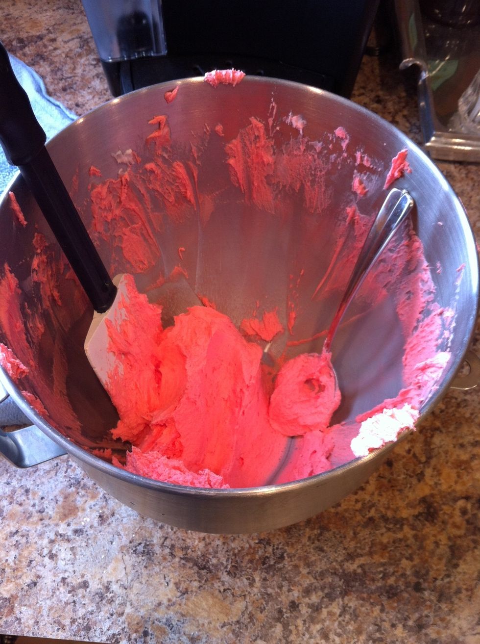 Tint your icing to whatever color you want for your "flowers". I used red for the regular ones and light pink for the buds