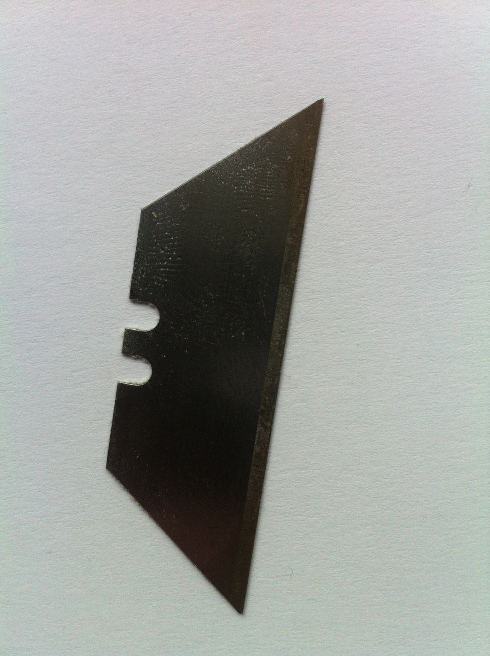 Tip 5a: Cutting the Dough - just before the bread gets placed in the oven the top is cut to allow the dough to rise. If you use a blade (above) lightly oil it before use to stop it ripping the crust