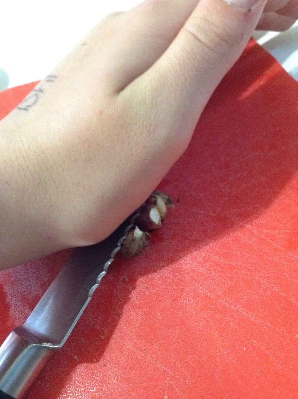 | TIP | Crush the garlic with the flat side of a knife to get the skin (is that the word?) off easily