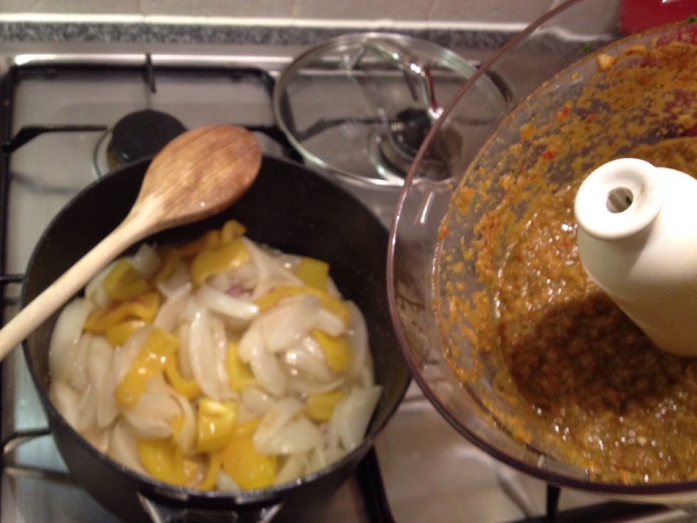 Tip in the paste and cook for about 5 minutes. Pour in 500 ml of boiling water. Drain the chick peas and add to the pan with the tomato pur\u00e9e, some salt and pepper. Stir well.