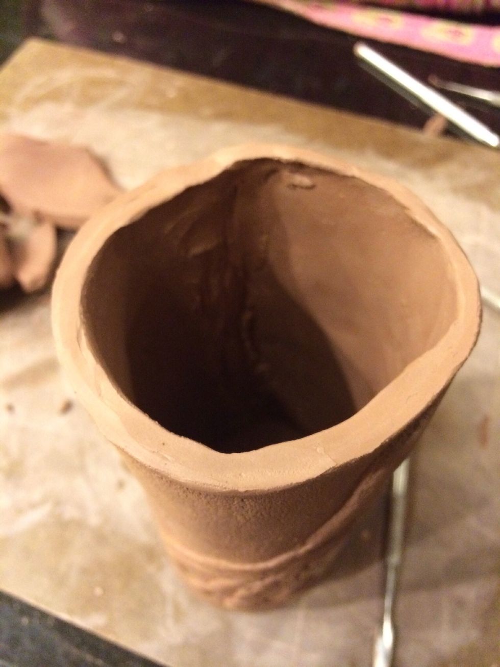 Tip: make sure there aren't any sharp edges on the lip of the cup. Once glazed the lip could be very sharp and uncomfortable for drinking from.